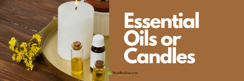  A display of essential oils, a burning white candle, and yellow flowers on a golden tray against a wooden background.